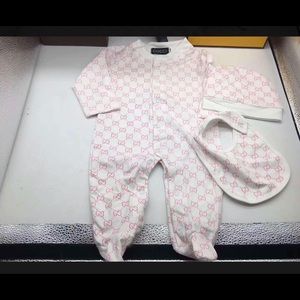 Baby girl romper, jumpsuit. Gucci